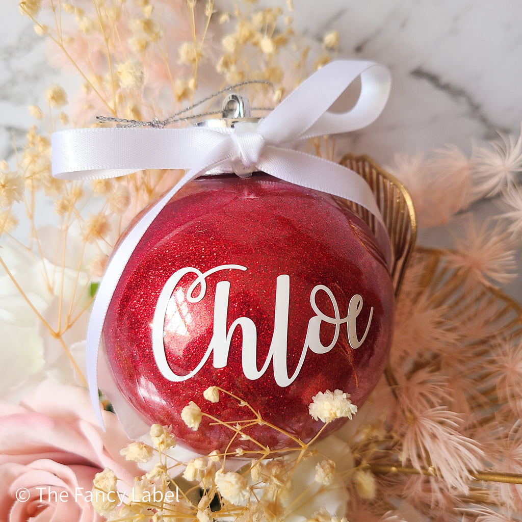 christmas personalised name bauble red with white bow and glitter