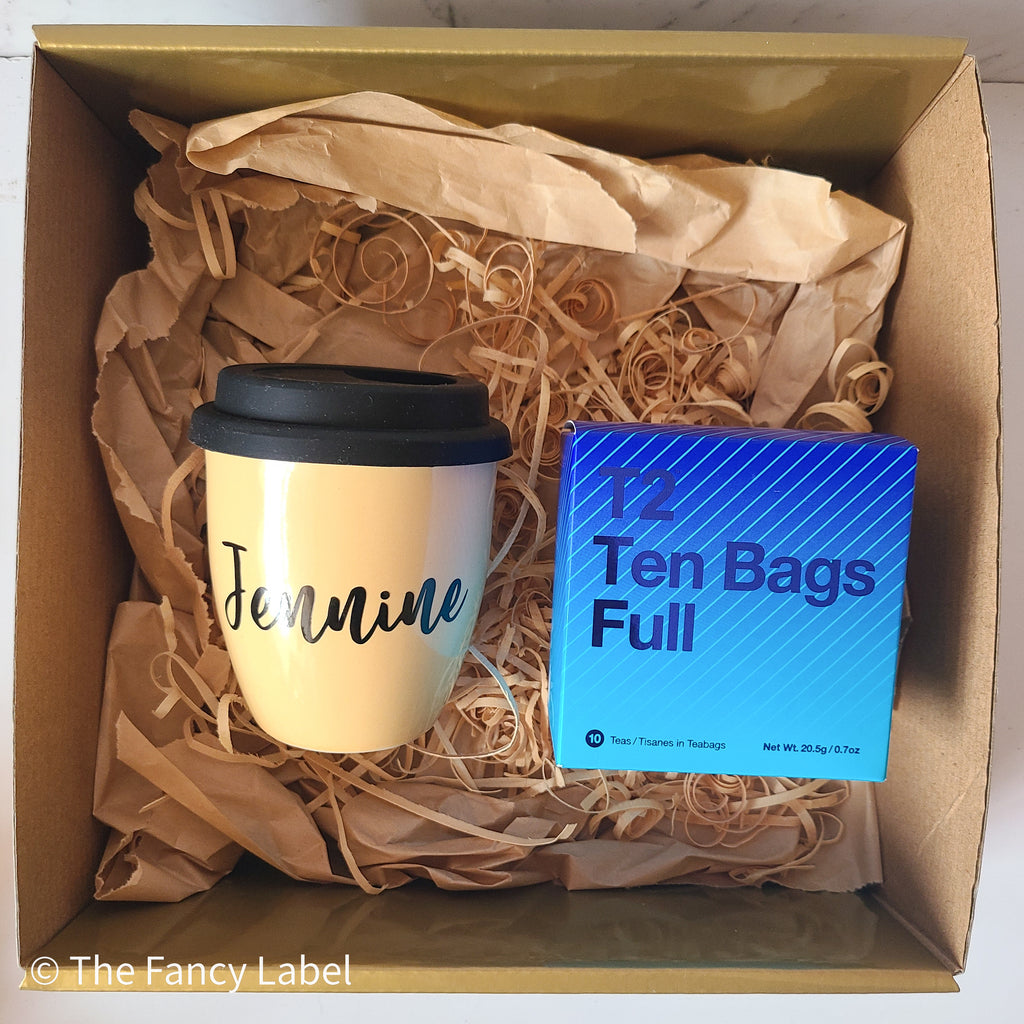 personalised reusable travel mug with pack of tea from t2 