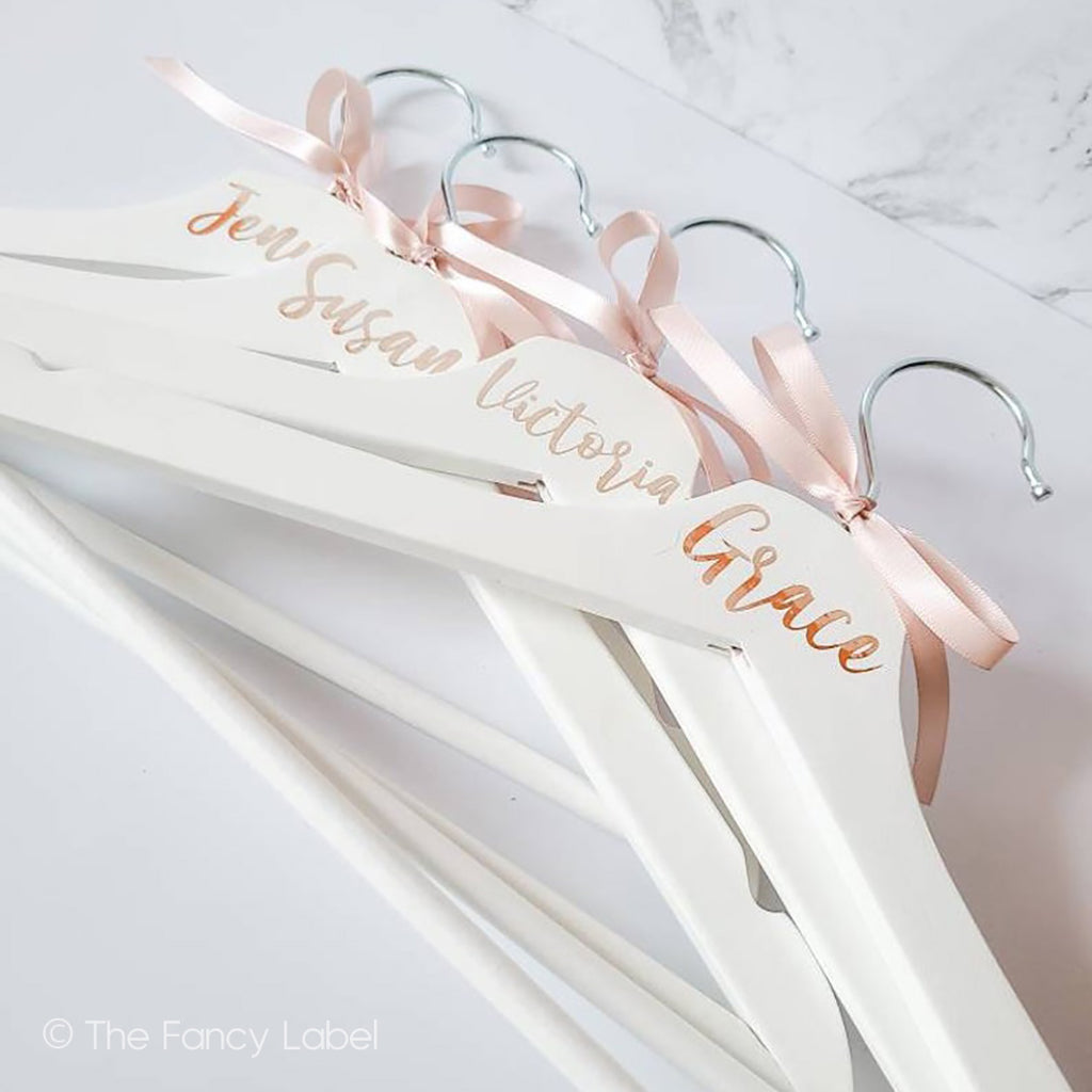 Personalised Coat Clothes Hanger rose gold and white with bow for bridal and wedding favours